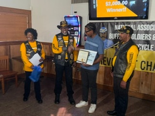 Joshua Strickland receiving 2026 scholarship award